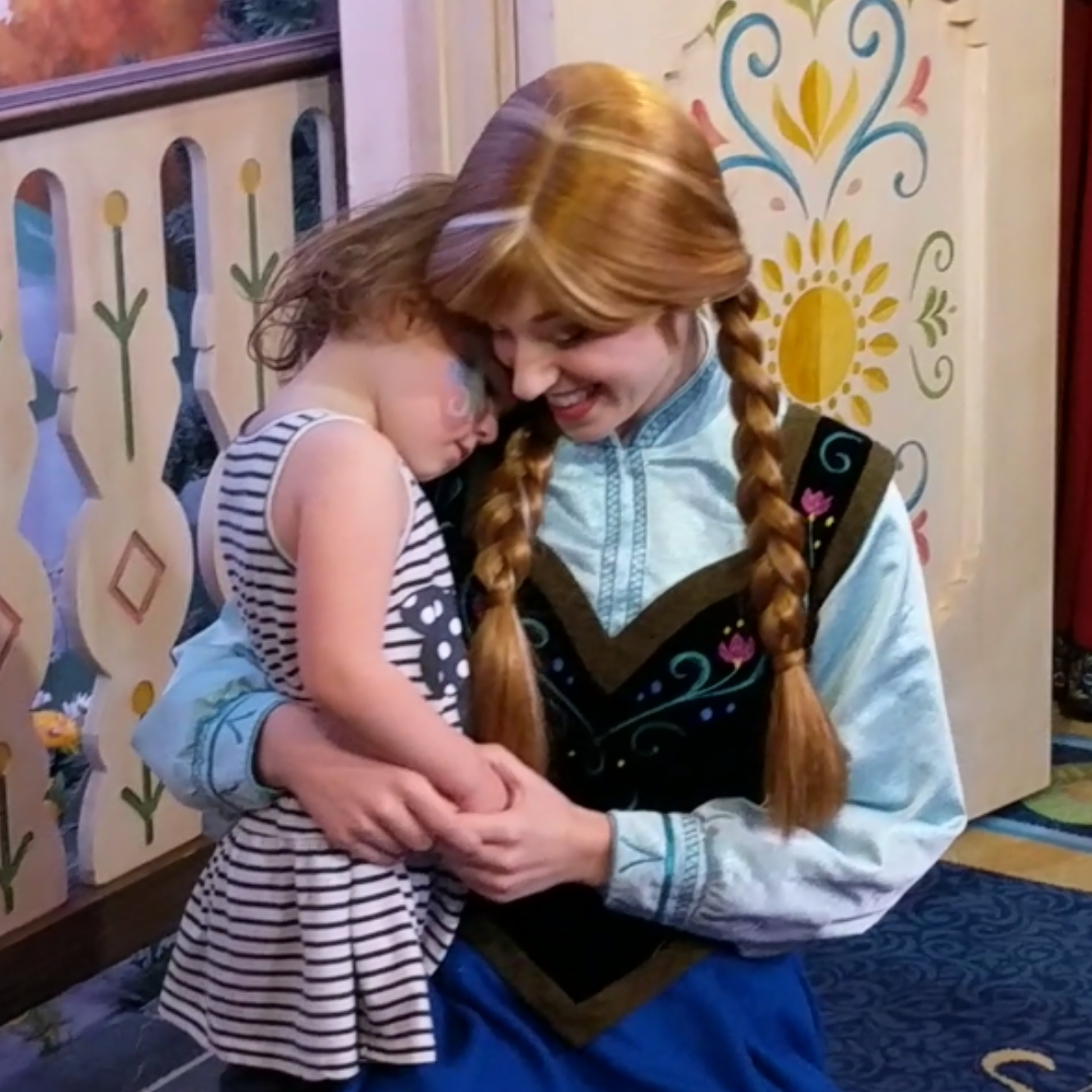 Princess Anna giving my daughter a hug