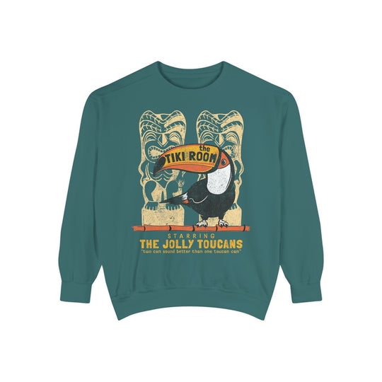 Tiki Room Sweatshirt in Blue Spruce, front flat lay with toucan, tiki poles and Starring The Jolly Toucans text