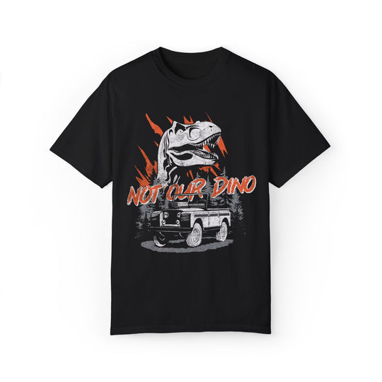 Not Our Dino Tee in Black, front flat lay with Dinosaur ride Carnotaurus, Time Rover jeep and Not Our Dino text