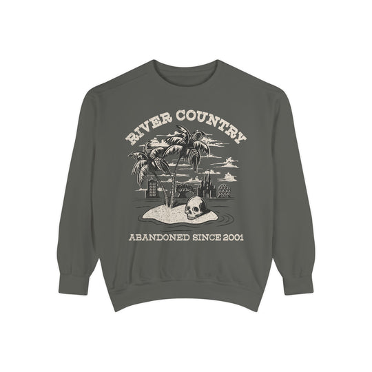 River Country Sweatshirt in Pepper, flat lay front with palm trees, a skull and Abandoned Since 2001 text