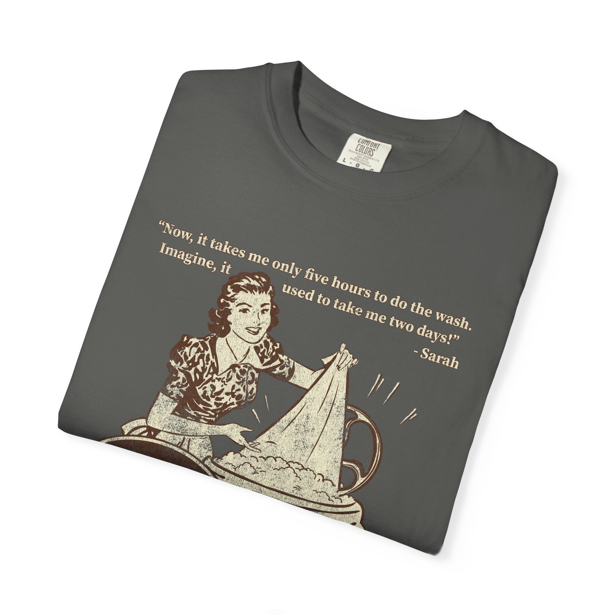 Washday Marvel tee — vintage-ad style Carousel of Progress shirt with a 1940s housewife at her new washing machine, on a Comfort Colors pepper tee