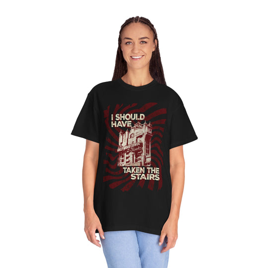 Should Have Taken The Stairs Tee in Black worn by a woman in light jeans, front view