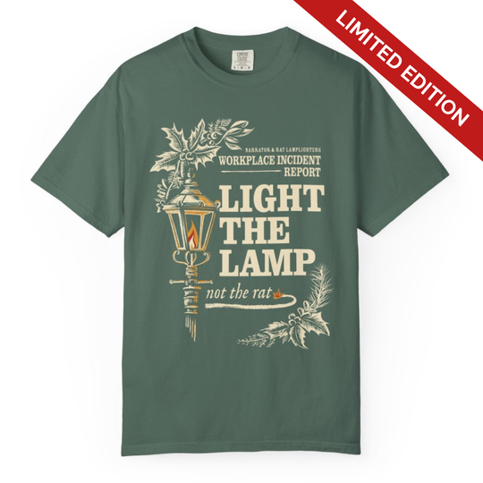 Light the Lamp, Not the Rat Christmas Shirt in Blue Spruce, front flat lay with a lamppost and Limited Edition banner