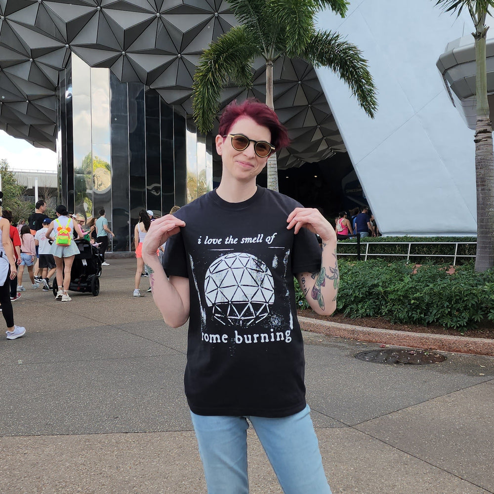 Model wearing Rome burning tee vintage style Disney shirt