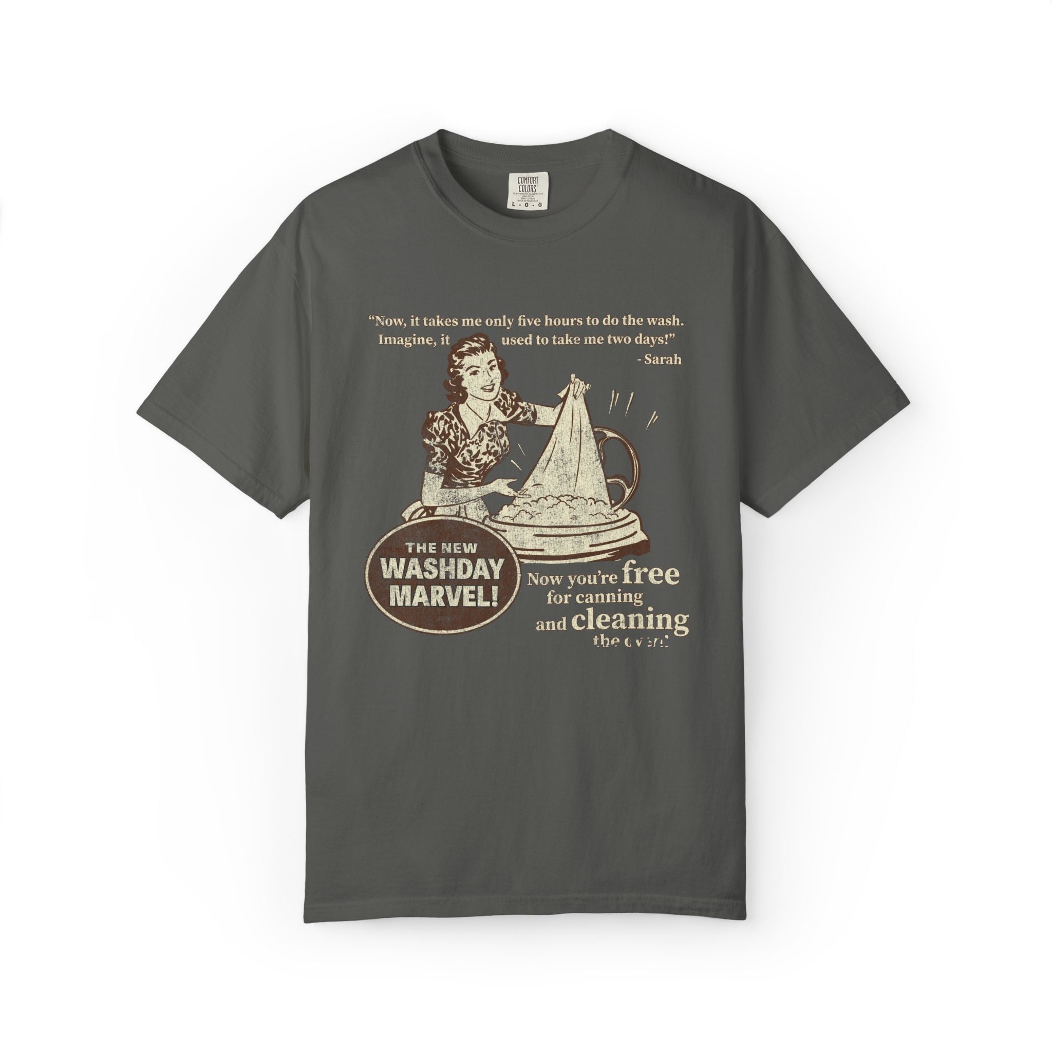 Washday Marvel tee — vintage-ad style Carousel of Progress shirt with a 1940s housewife at her new washing machine, on a Comfort Colors pepper tee